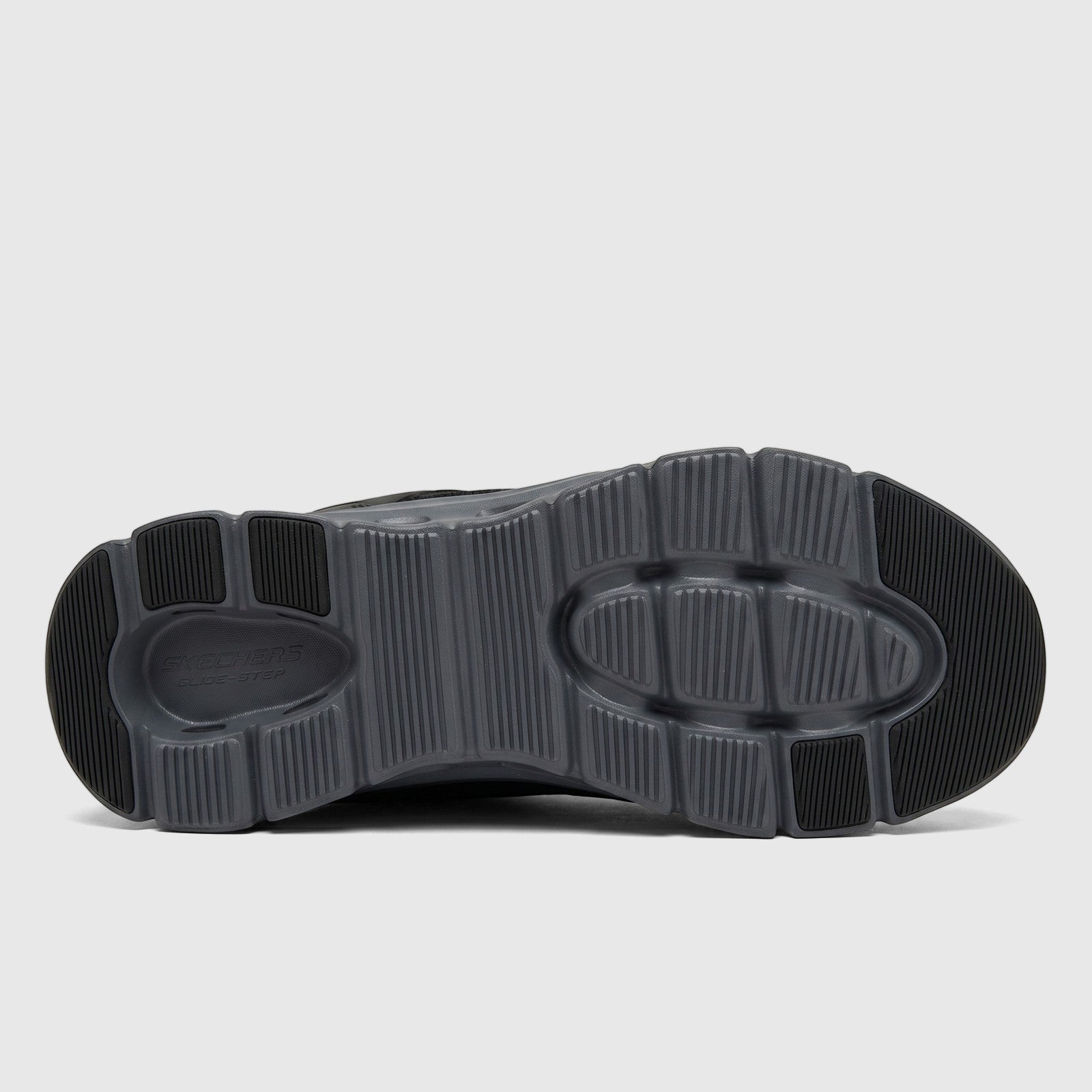 Sole view of a dark grey Skechers Men's Comfort Sneaker Glide-Step Pro 232930 with a textured outsole.