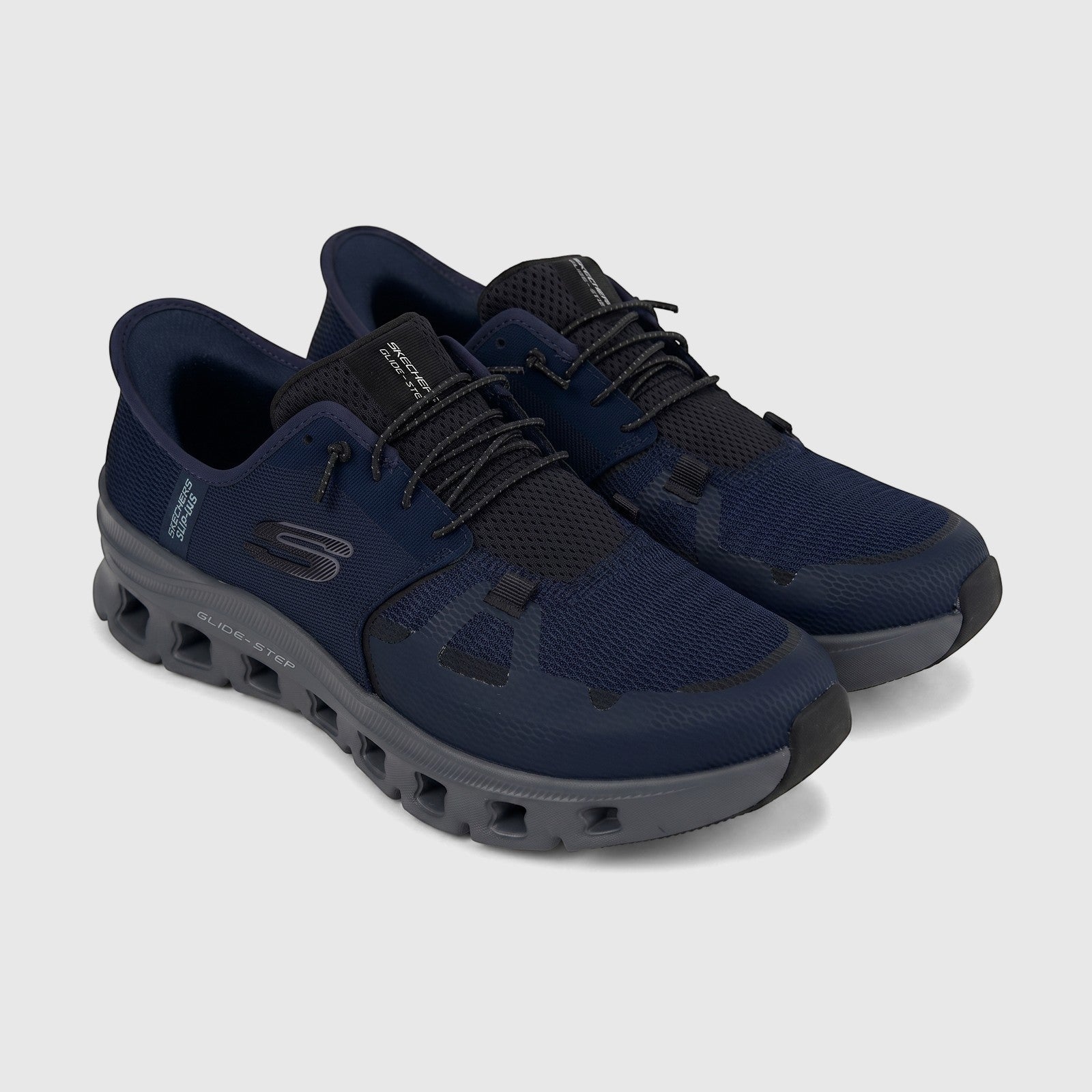 Skechers Men's Comfort Sneaker Glide-Step Pro 232930 in navy and charcoal, showcasing the slip-ins design and textured sole.