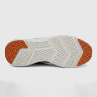 Skechers Men's Comfort Sneaker Go Run Elevate 220189, featuring a durable off-white and orange sole with textured grip.