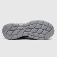 Bottom view of a Skechers Men's Comfort Sneaker Go Run Lite with a gray, patterned outsole and visible brand logos.