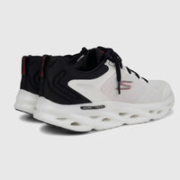Pair of Skechers Men's Comfort Sneaker Go Run Swirl Tech Speed 220905 in white and black, shown from the side profile.