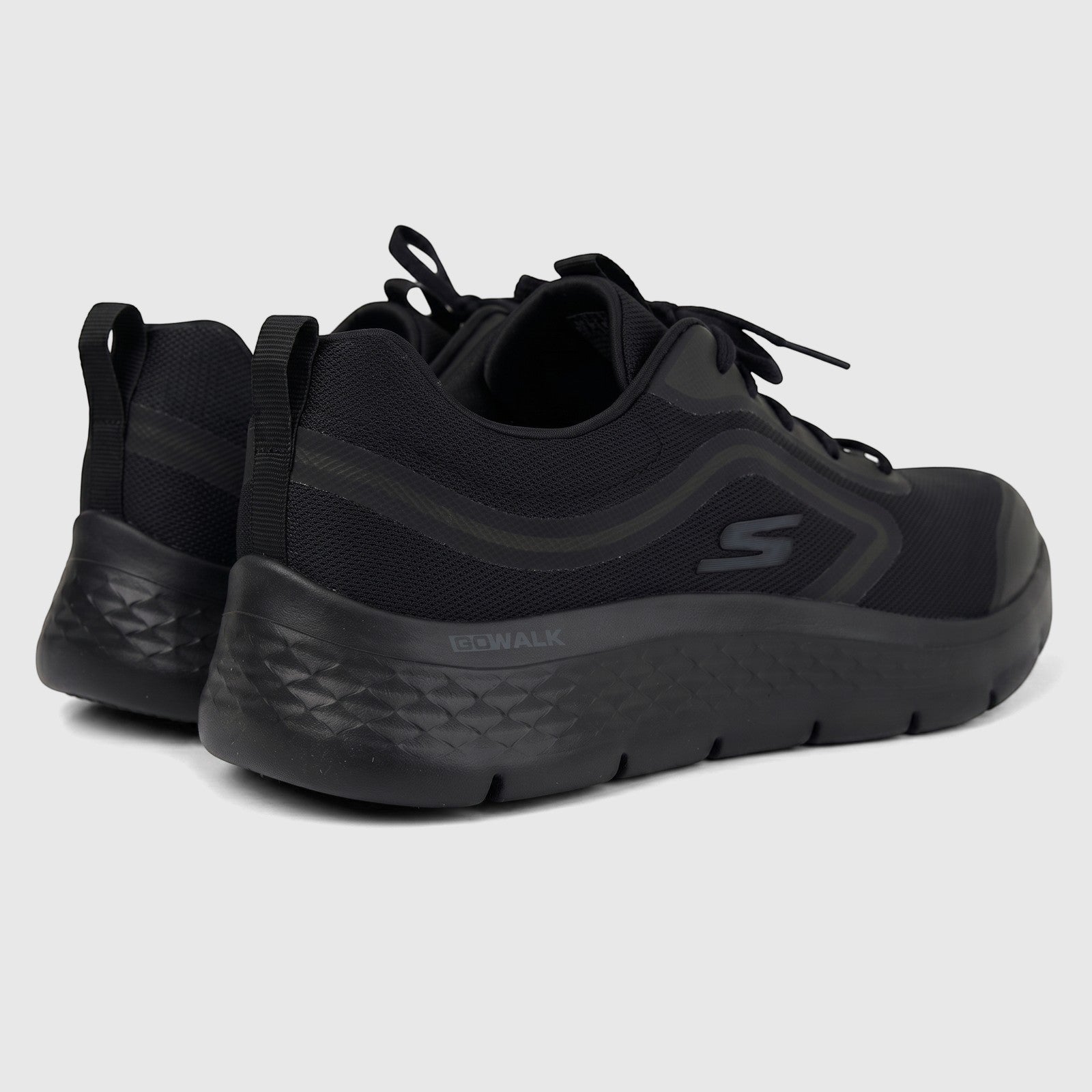 Black Skechers Men's Comfort Sneaker Go Walk Flex 216508, featuring a mesh upper, textured sole, and 'GOWALK' branding.