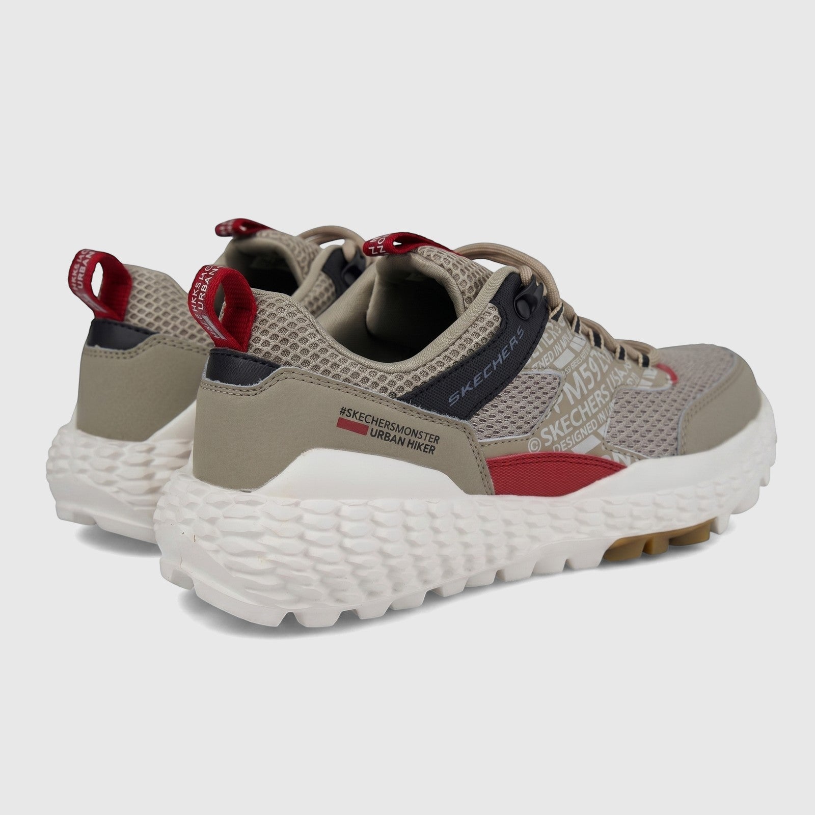 Skechers Men's Comfort Sneaker Monster Mashton 232189 in taupe multi, shown from a rear-quarter view, featuring a chunky