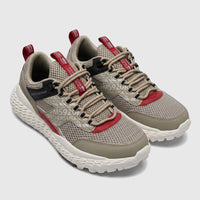 Pair of Skechers Men's Comfort Sneaker Monster Mashton 232189 in taupe multi, shown at a slight angle with red and black