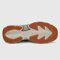 Bottom view of an off-white Skechers Men's Comfort Sneaker Skech-Air Ventura sole, highlighting the durable brown rubber
