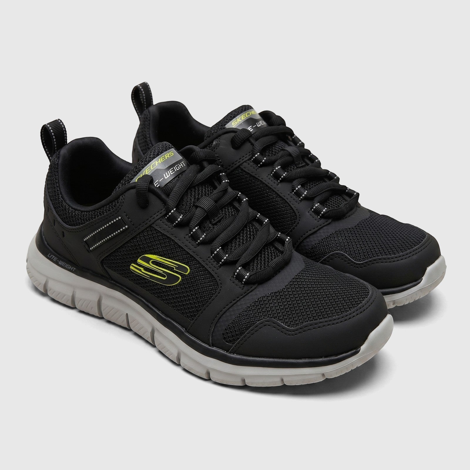 Skechers Men's Comfort Sneaker Track 232001 in black with lime green accents and grey soles, shown on a white background.