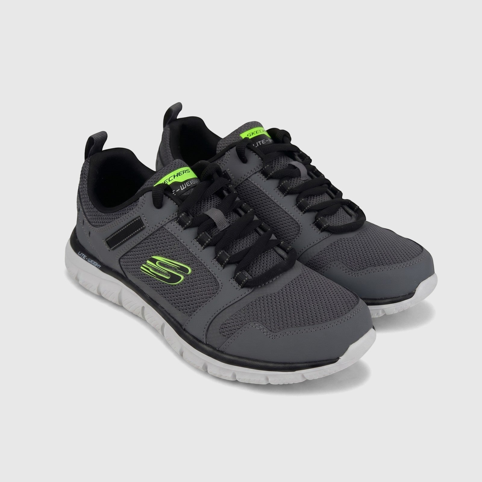 A pair of Skechers Men's Comfort Track sneakers in charcoal grey and black, shown from a slightly elevated side view.