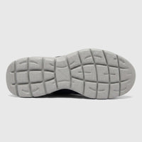 Skechers Men's Comfort Slip On Summits Vindicator shoe, shown from the bottom, highlighting the gray patterned outsole and
