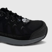 Black Skechers Men's Composite Toe safety sneaker, side view, featuring a durable mesh and synthetic upper with a grey sole.