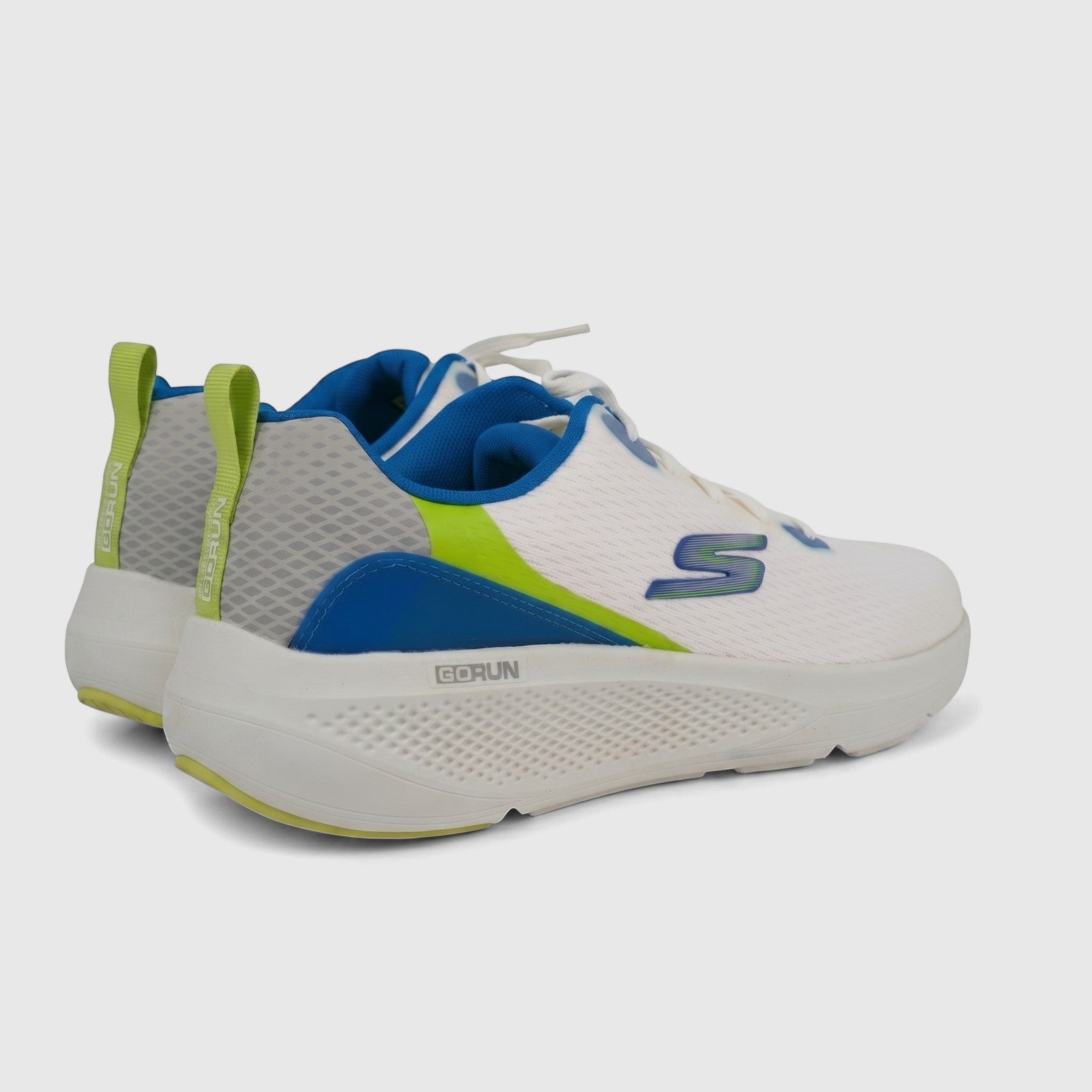 Pair of Skechers Men's Go Run Elevate 220189 comfort sneakers in white and multi-color, shown from a rear-side view.