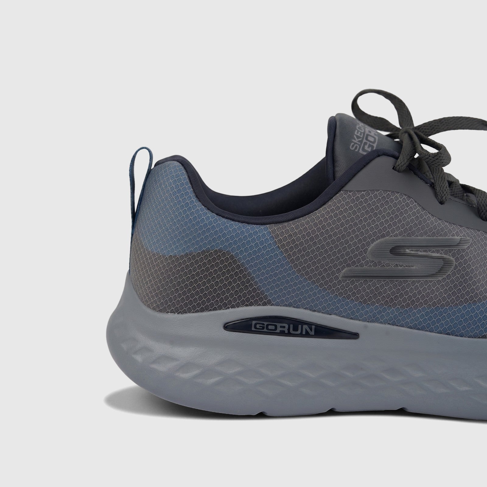 Skechers Men's Go Run Lite running sneaker in charcoal gray and blue, featuring the 'S' logo, shown in a side profile view.