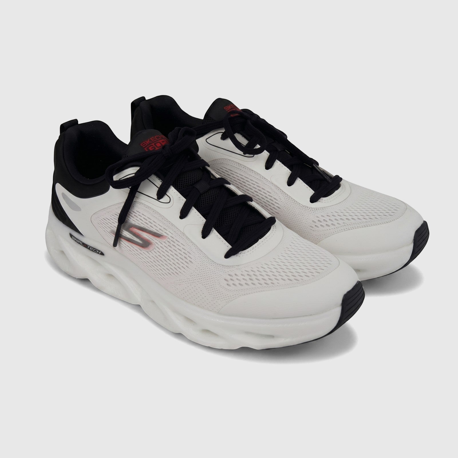 Pair of Skechers Men's Go Run Swirl Tech Speed 220905 comfort sneakers in white and black, shown from a slight high-angle