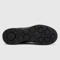 Skechers Men's Go Walk 7 216636 black comfort sneaker, showcasing the full textured sole from a bottom view.