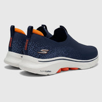 Pair of Skechers Men's Go Walk 7 comfort slip-on sneakers in navy with orange accents, shown from a rear-quarter view.