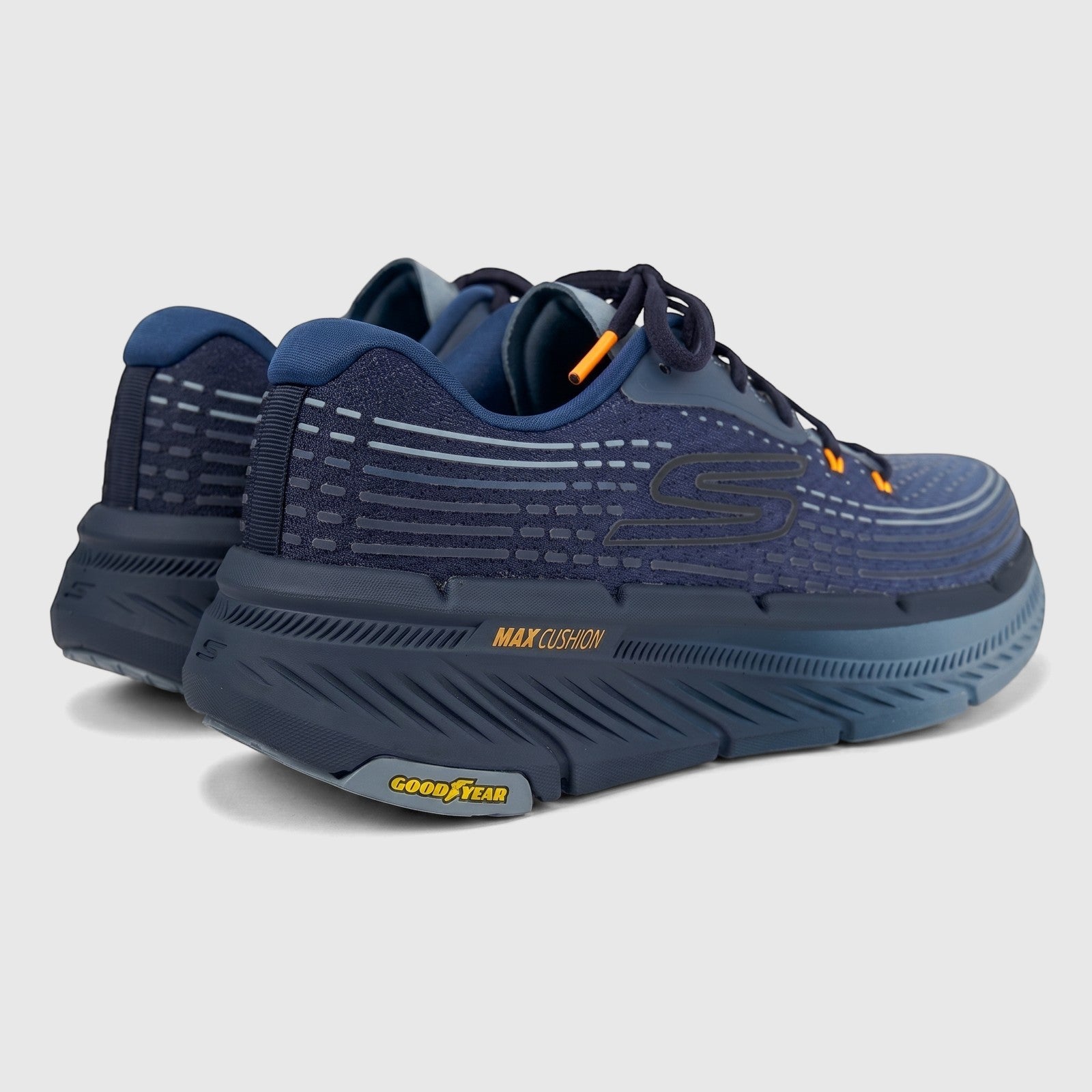 Rear and side view of dark blue Skechers Men's Comfort Sneaker Max Cushioning Premier 2.0 with orange accents and Goodyear