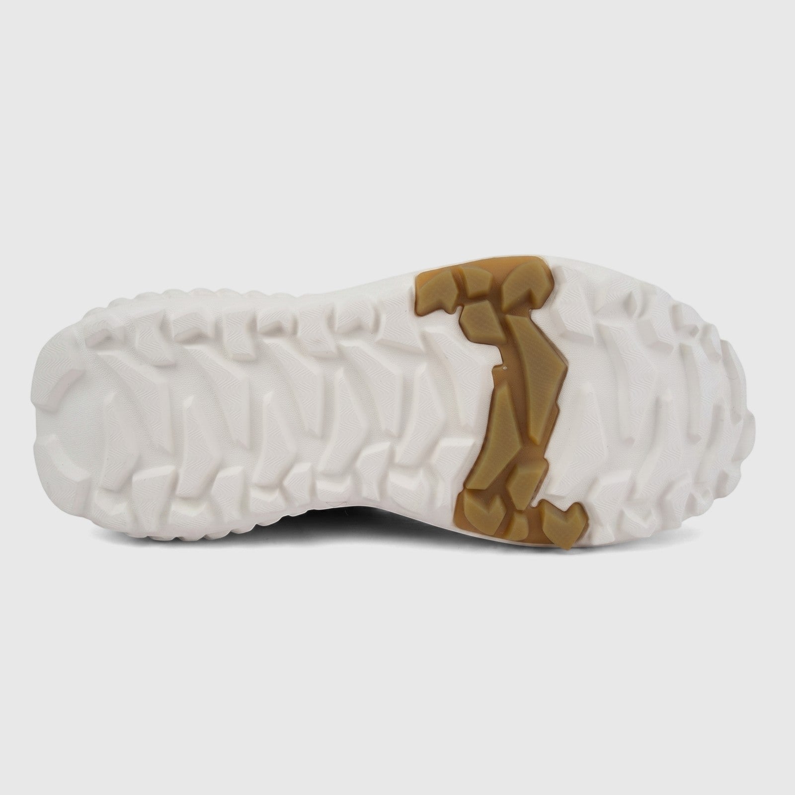 Underside view of Skechers Men's Monster Mashton comfort sneaker sole, featuring rugged white and tan multi-directional
