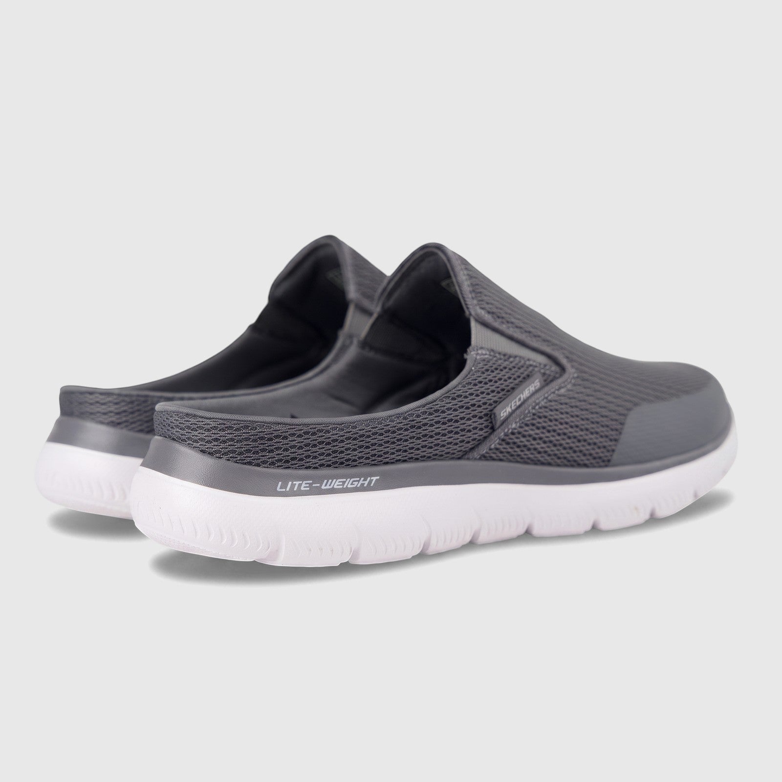 Pair of Skechers Men's Summits Vindicator 232574 grey mesh open-back slip-on comfort shoes with white soles, viewed from the