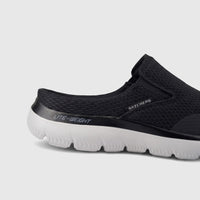 Close-up of a men's black Skechers Summits Vindicator slip-on comfort shoe with mesh upper and white lightweight sole.