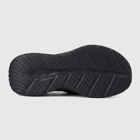 Close-up view of the black Skechers Mens Vapor Foam Slide Sandal sole, featuring detailed tread and branding.