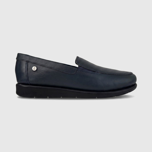 Thea Comfort Shoe Navy 01358 navy leather slip-on loafer, side view with low profile and thick black sole.