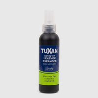Tuxan Spray-On Leather Expander, a black bottle with a white spray nozzle and blue and green label, for easing tight leather.