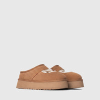 Ugg Bea Mary Jane ladies clog in chestnut suede with cozy shearling lining and chunky platform sole, side view.