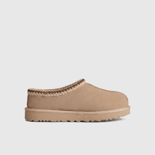 Ugg Ladies Clog Tasman II Moonlight slip-on clog in light beige suede with braided collar trim, side view