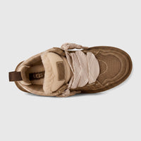 Ugg Ladies Sneaker Lowmel 1144032 in light bronze, top view showing wide laces and plush lining.