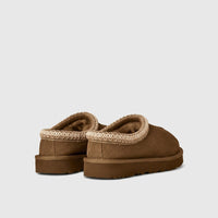 UGG Ladies Tasman II clog in light bronze suede, back view showing braided collar trim and plush lining.