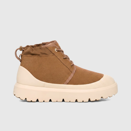 UGG Neumel Weather Hybrid ladies boot in chestnut suede with white cap and chunky sole, side view.