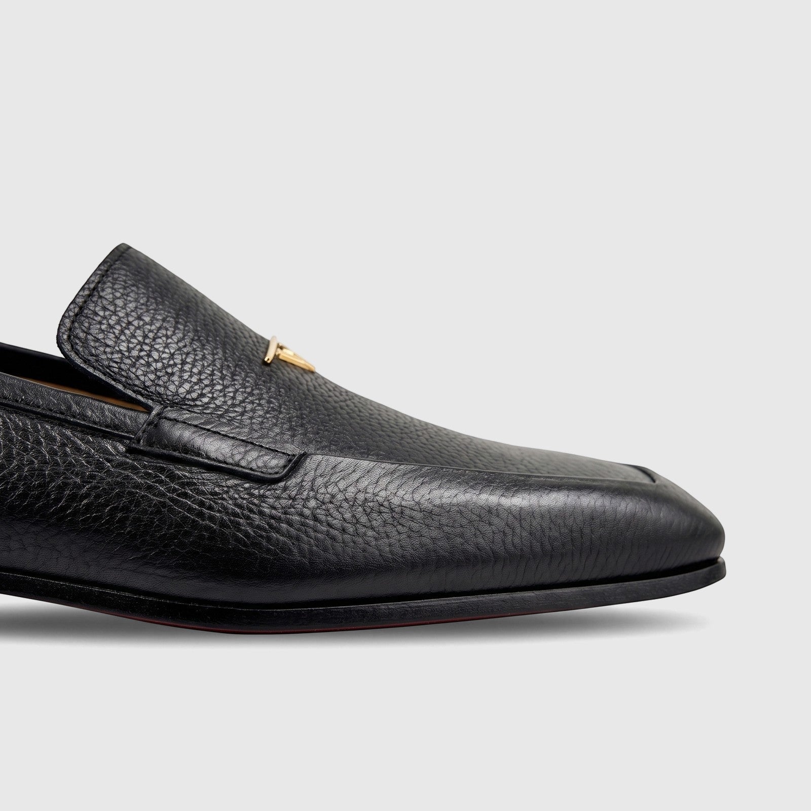 Valentino Men's Black Leather Dress Slip On shoe, model 21354 VL19, shown in a side view highlighting the pebbled texture