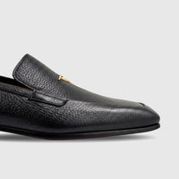 Valentino Men's Black Leather Dress Slip On shoe, model 21354 VL19, shown in a side view highlighting the pebbled texture