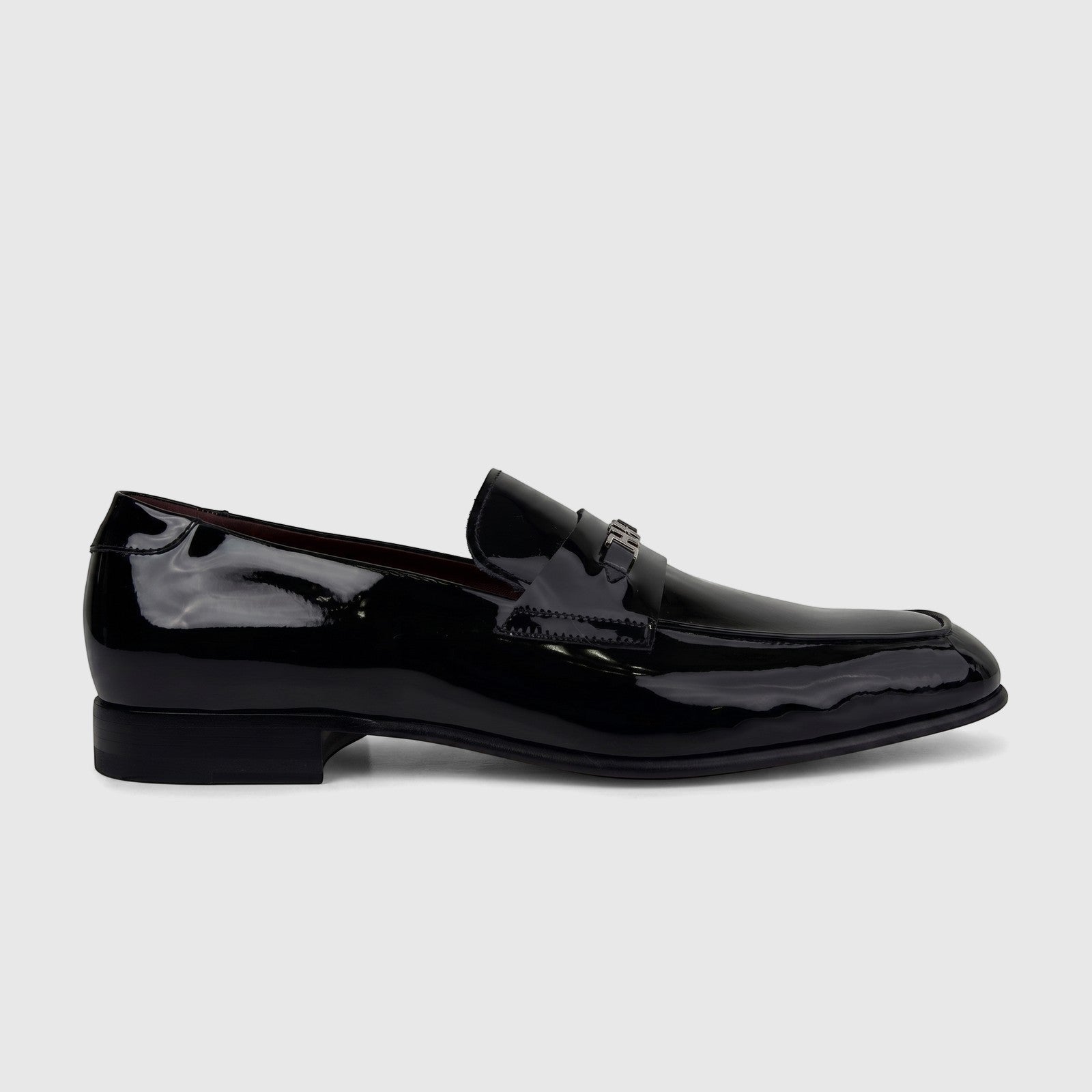 Valentino Men's Black Patent Leather Dress Slip-On Shoe, model 21495 VL16, shown from a side profile.