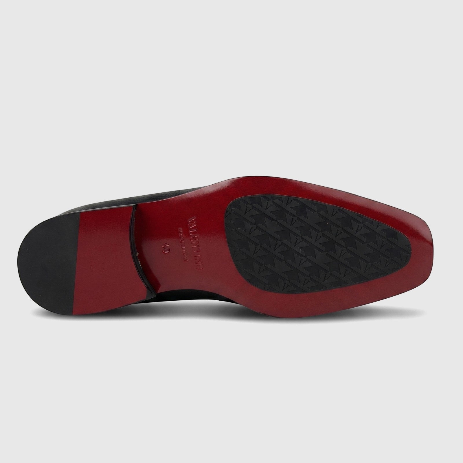 Valentino Men's Black Leather Dress Slip On shoe, style 21354 VL19, shown from the underside displaying the distinctive red