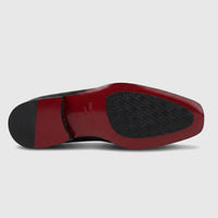 Valentino Men's Black Leather Dress Slip On shoe, style 21354 VL19, shown from the underside displaying the distinctive red